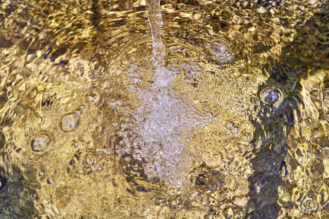 water droplets on brown soil