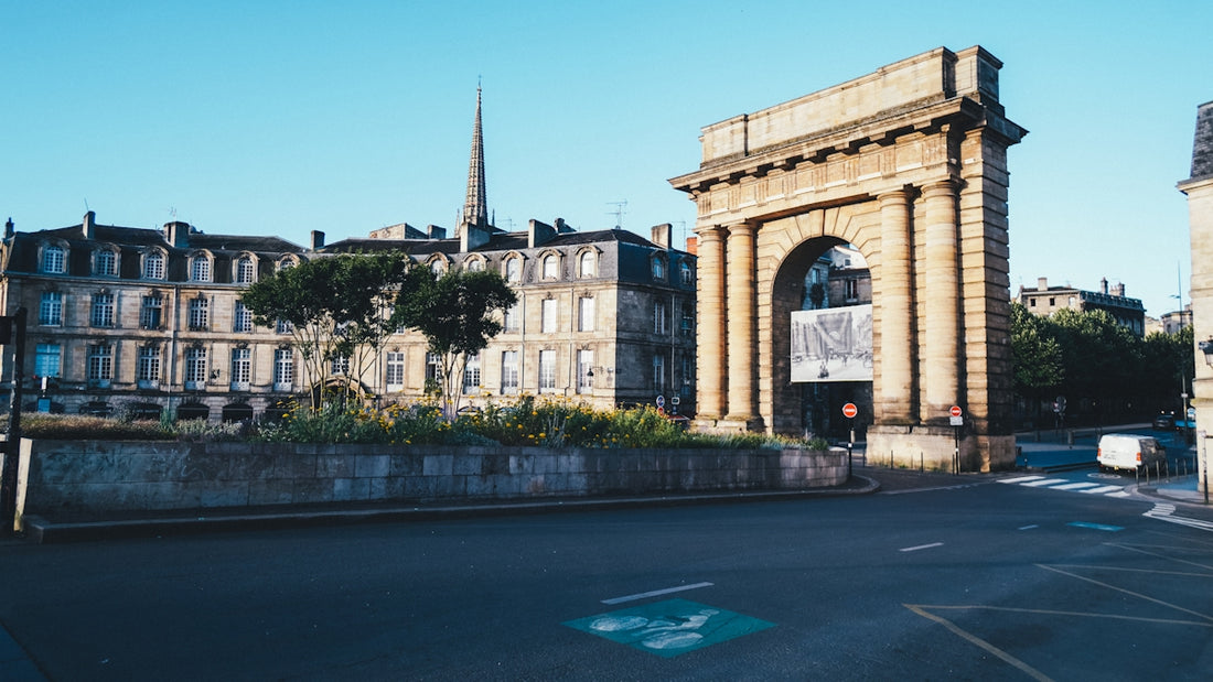 a road with a building on the side